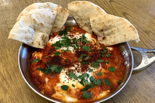 Delicious Shakshuka – Eggs poached in a spicy stewed tomato sauce