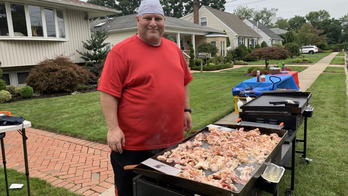Ben cooking with 2 Blackstone Griddles